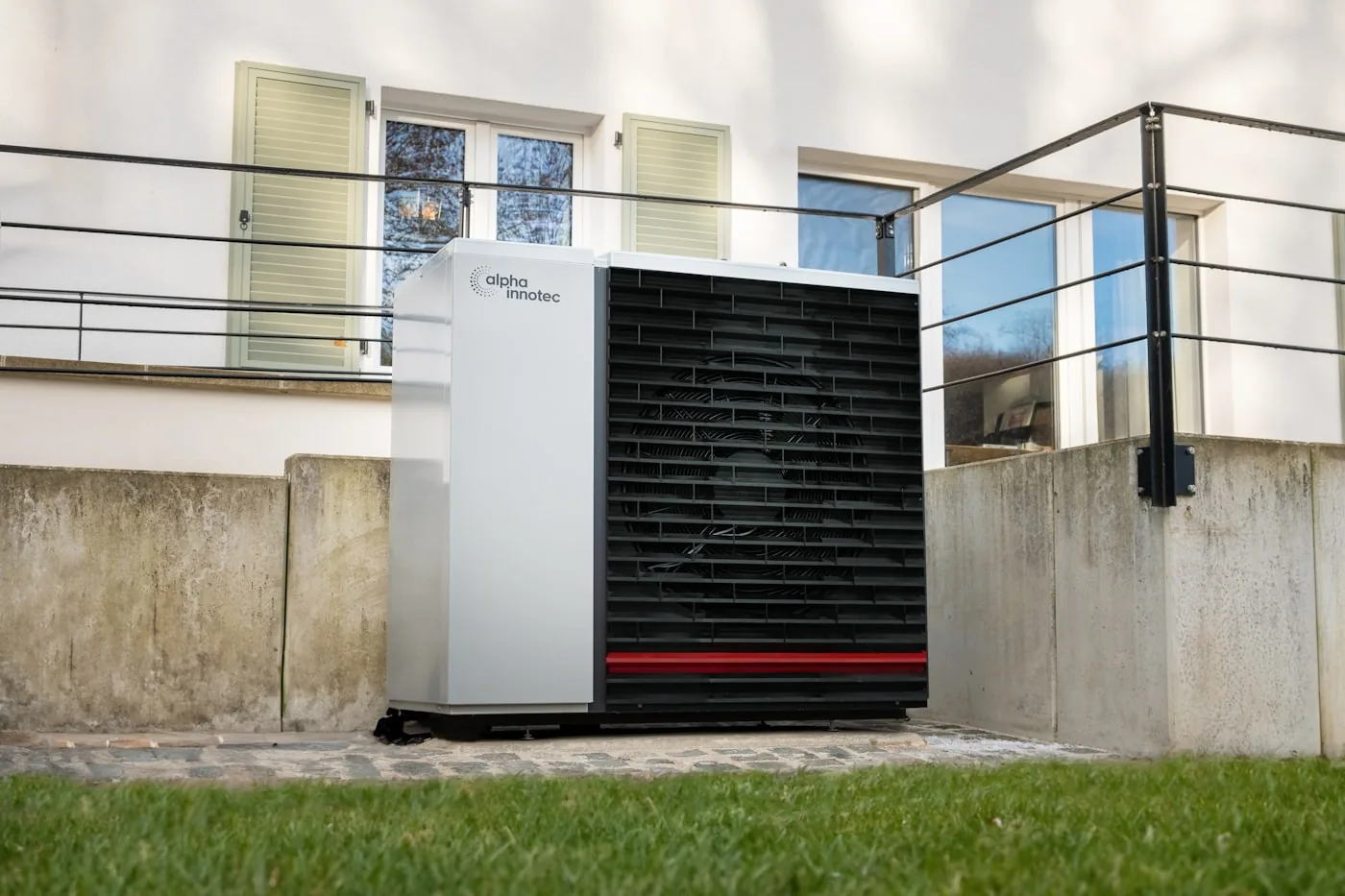 Air conditioning unit installed at the front of a residential building
