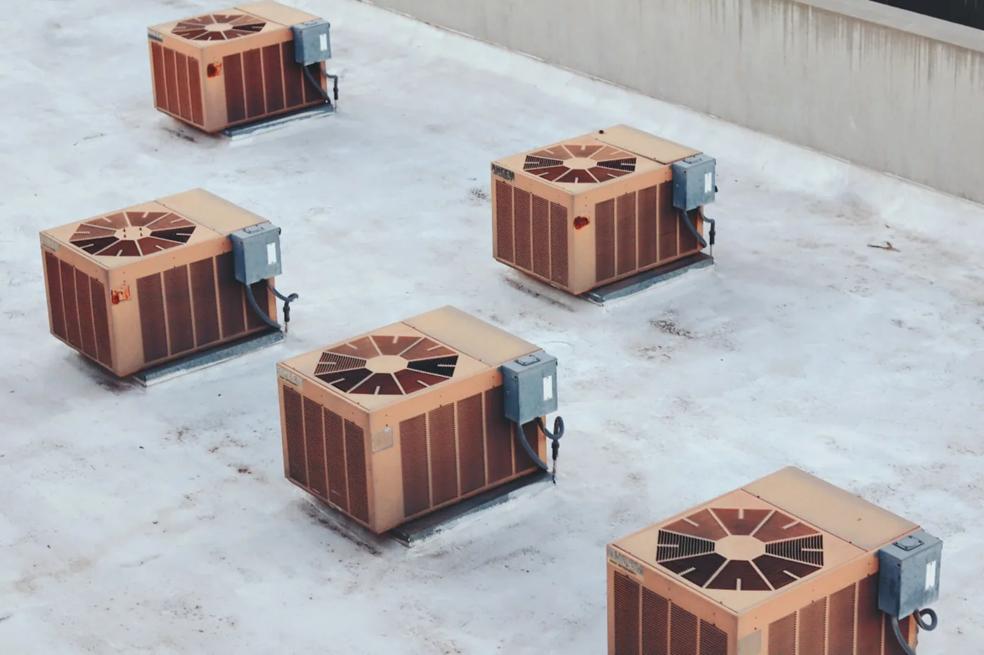 Rooftop packaged HVAC units on a commercial flat roof