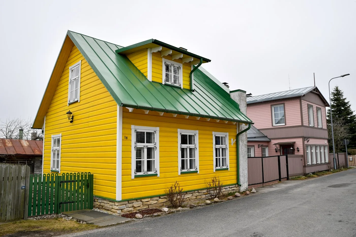 Residential house with a pitched metal roof