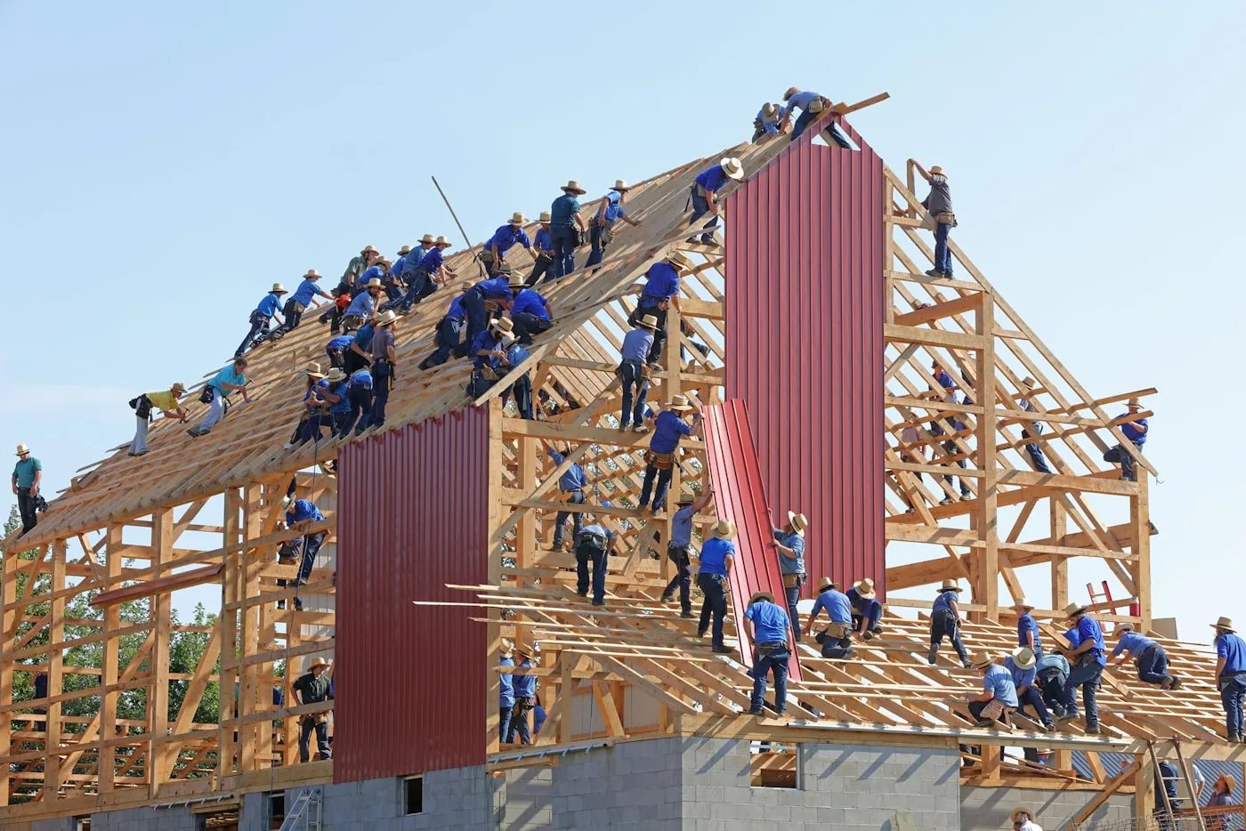 Construction crew framing a new roof structure