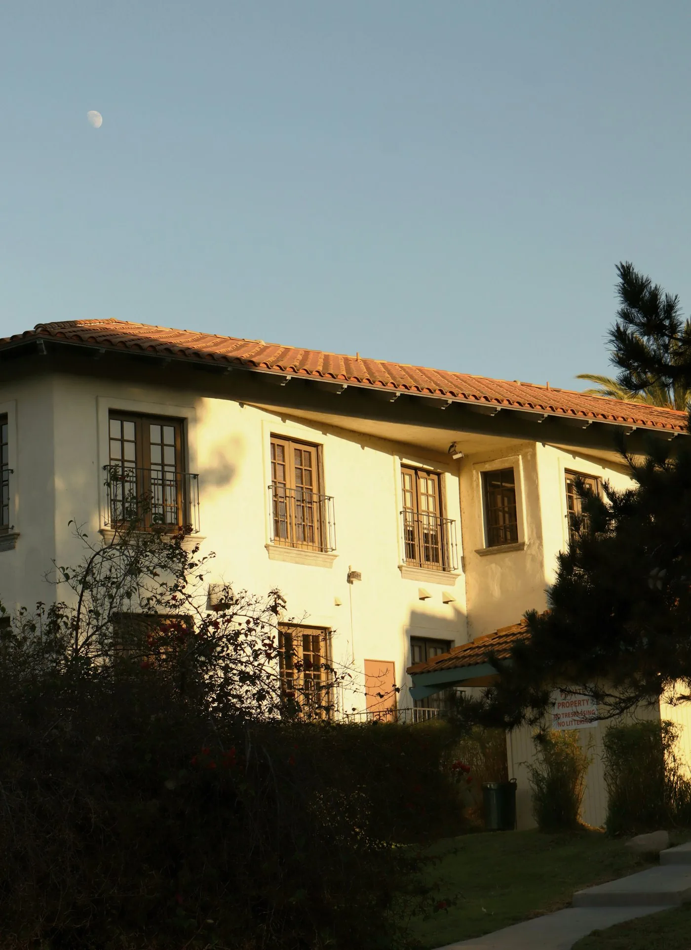 Tiled residential roof against the sky